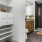Custom closet with direct access to primary bathroom