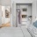 Bedroom with custom closets at The Saint Grand